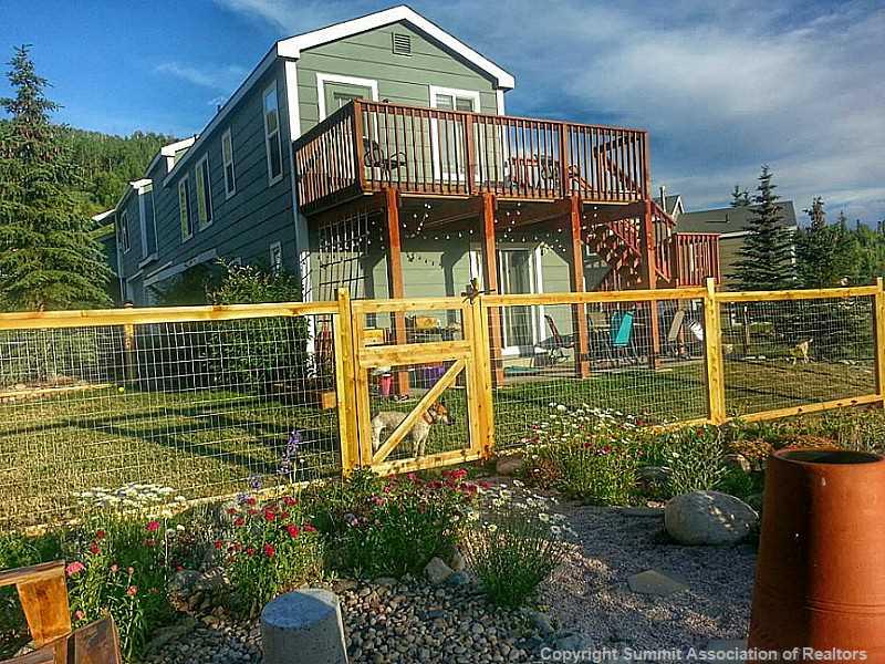 820 Alpine Road Dillon, CO 80435 - Photo 1 of 25 a front view of a house with garden