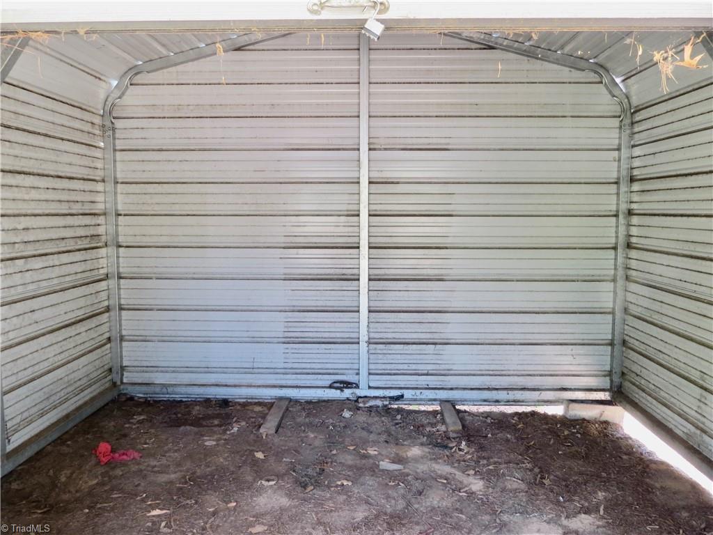 793 Wolf Island Road Reidsville, NC 27320 - Photo 21 of 22 Storage area in Carport