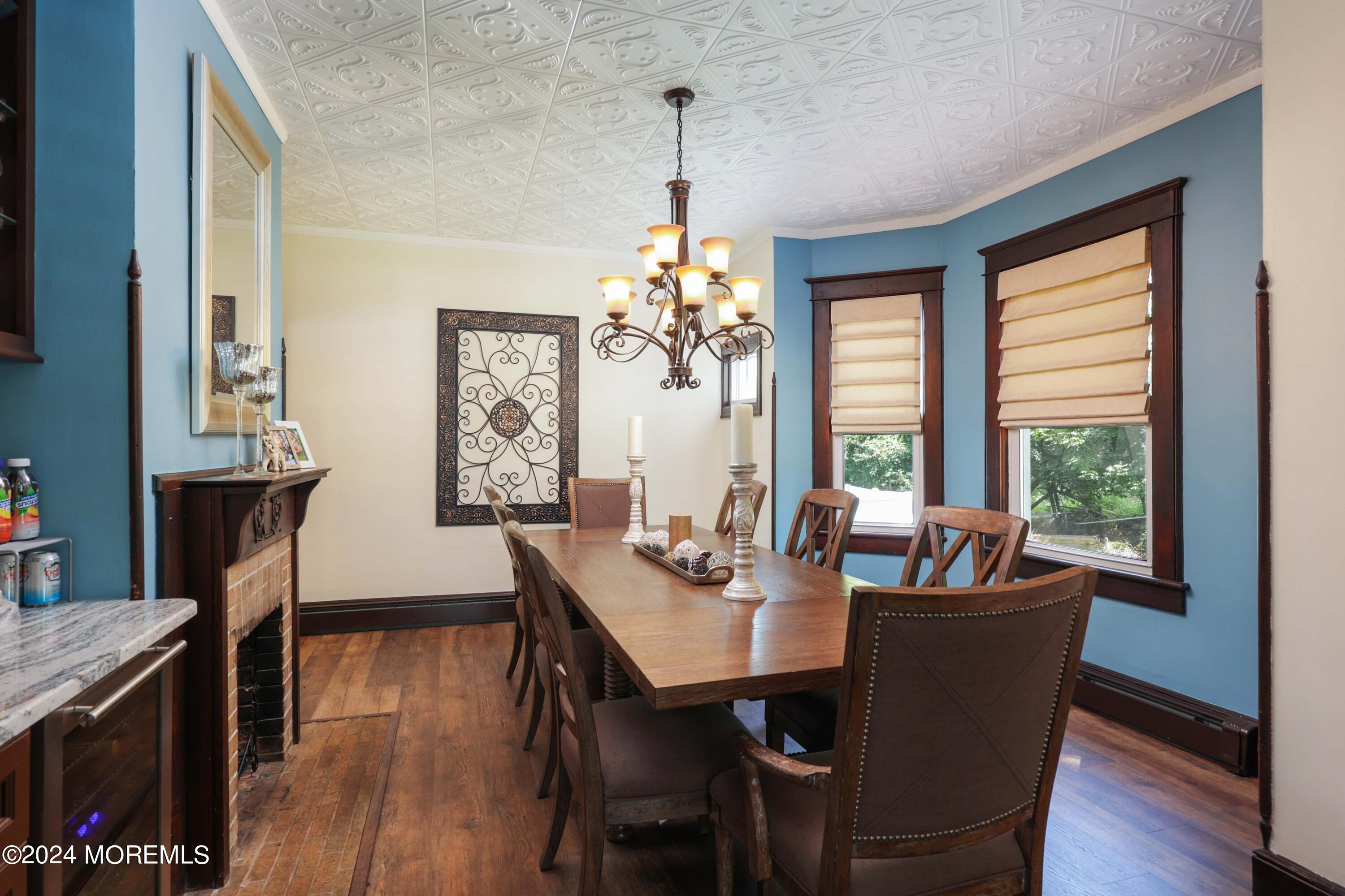 1158 West Front Street Lincroft, NJ 07738 - Photo 10 of 33 a dining room with furniture window wooden floor