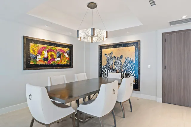 a bedroom with a bed and a potted plant