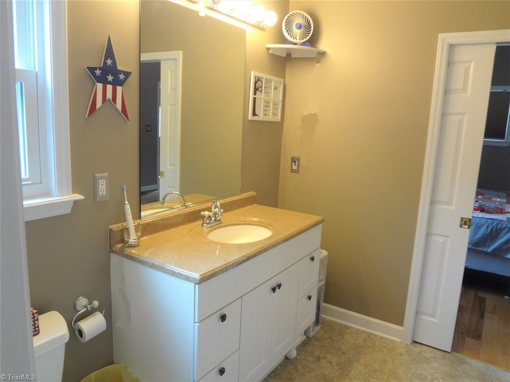 444 Rabbit Farm Trail Advance, NC 27006 - Photo 17 of 30 Note the space saving pocket door between the bath and Master Bedroom.