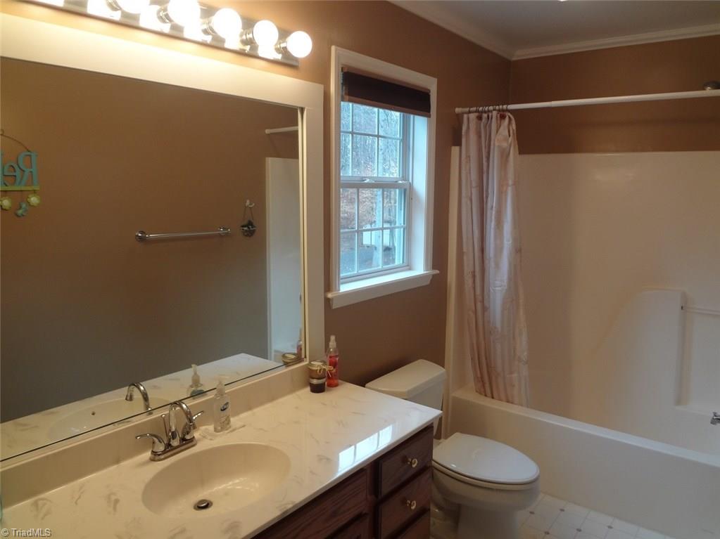444 Rabbit Farm Trail Advance, NC 27006 - Photo 20 of 30 The upstairs bath is spacious and light.