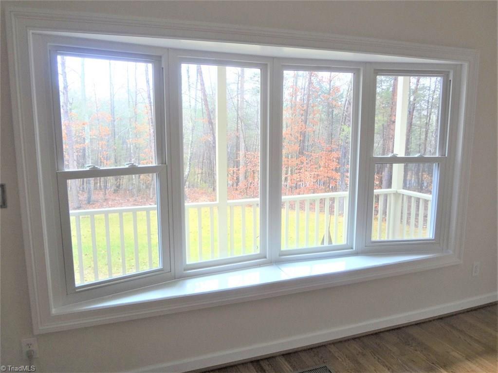 444 Rabbit Farm Trail Advance, NC 27006 - Photo 5 of 30 This custom window in the Great Room provides a beautiful view and lots of natural light inside.