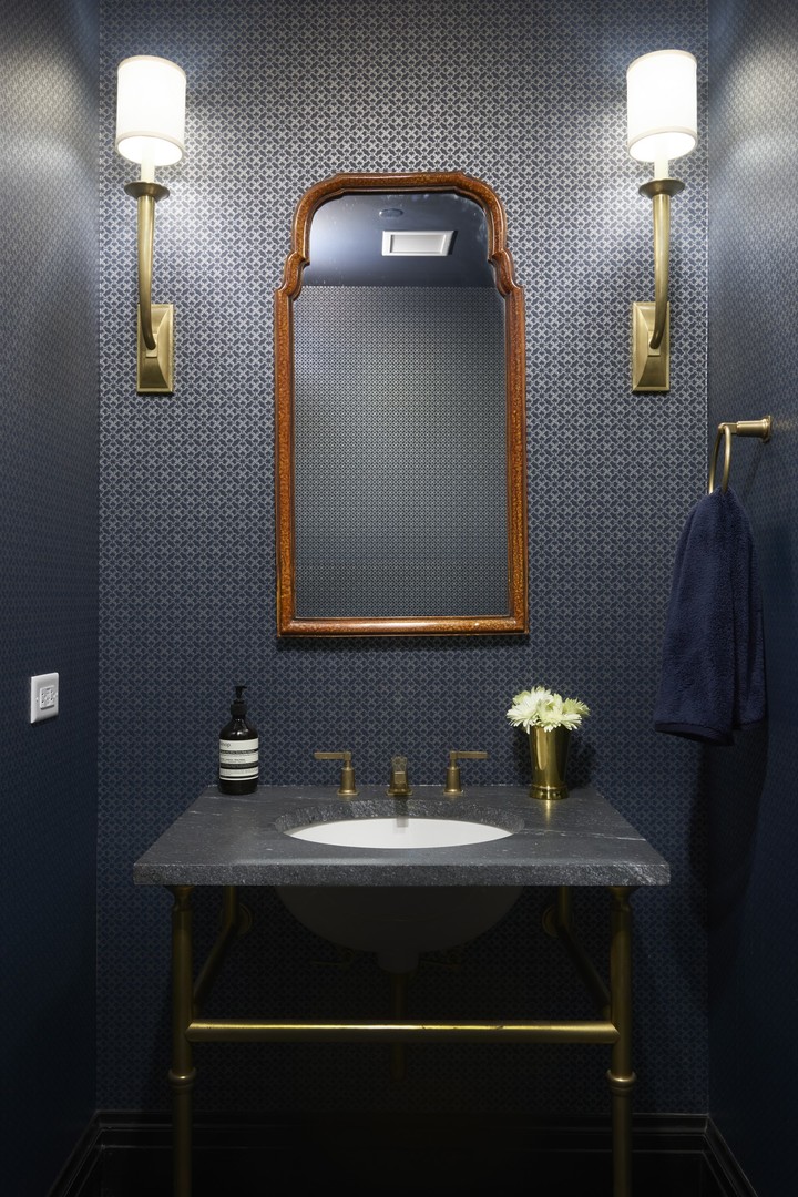 1109 West Washington Boulevard, Unit 5D Chicago, IL 60607 - Photo 13 of 21 a bathroom with a sink and a mirror