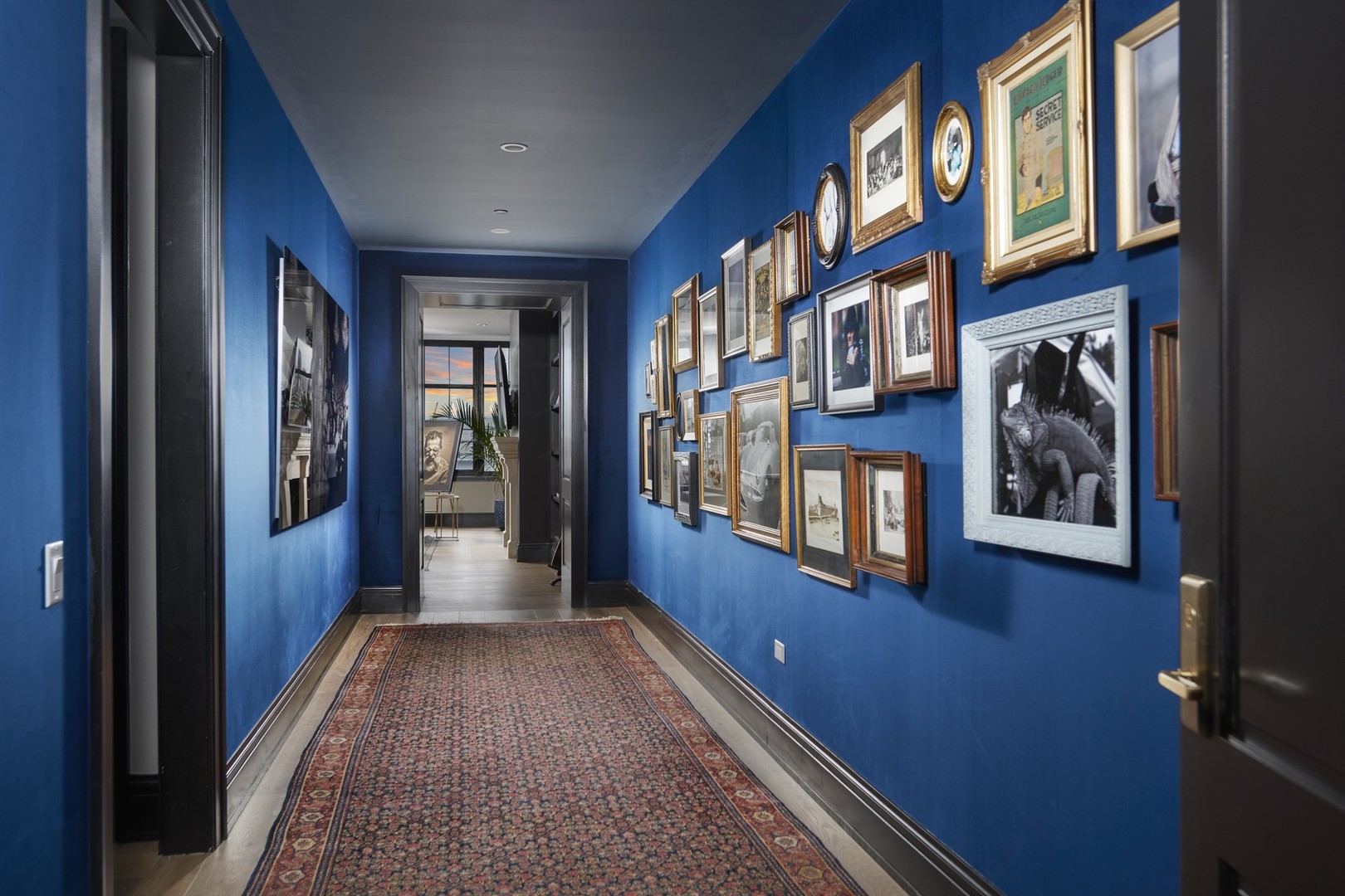 1109 West Washington Boulevard, Unit 5D Chicago, IL 60607 - Photo 3 of 21 a view of a hallway with wooden floor and windows