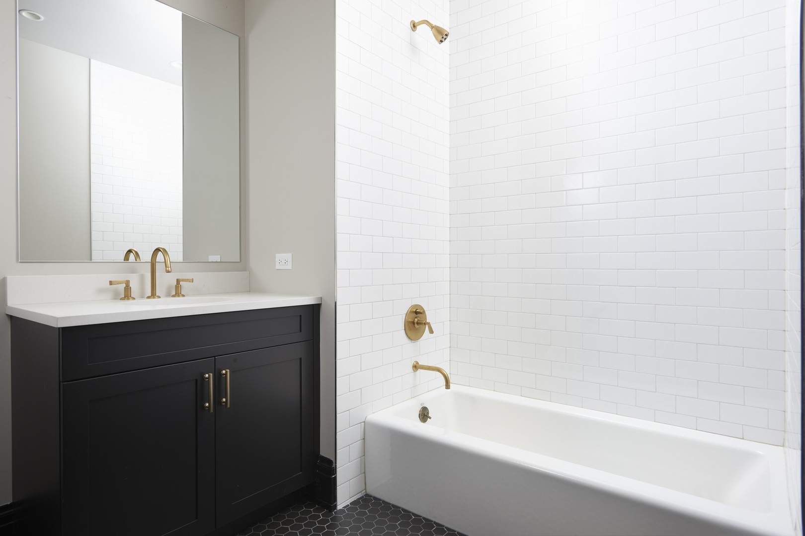 1109 West Washington Boulevard, Unit 5D Chicago, IL 60607 - Photo 21 of 21 a bathroom with a sink and a bathtub