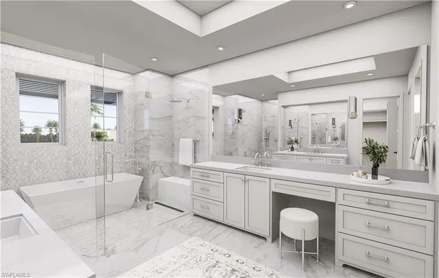 a bathroom with a granite countertop sink a toilet and shower