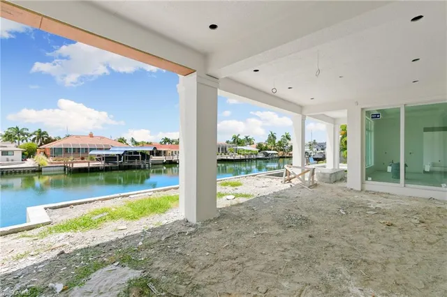 a view of swimming pool from a lake view