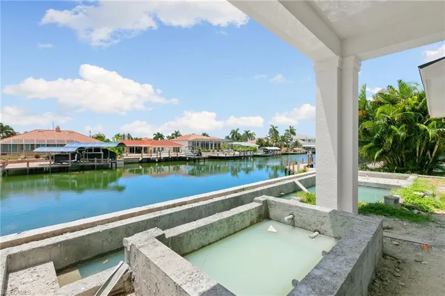 a view of a lake with a city