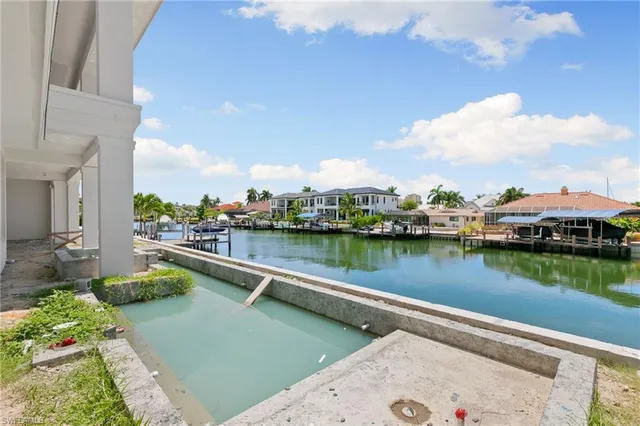 a view of a house with a ocean view