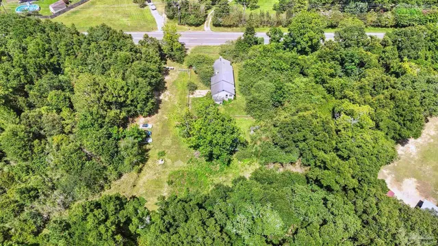 a view of a yard with an outdoor space