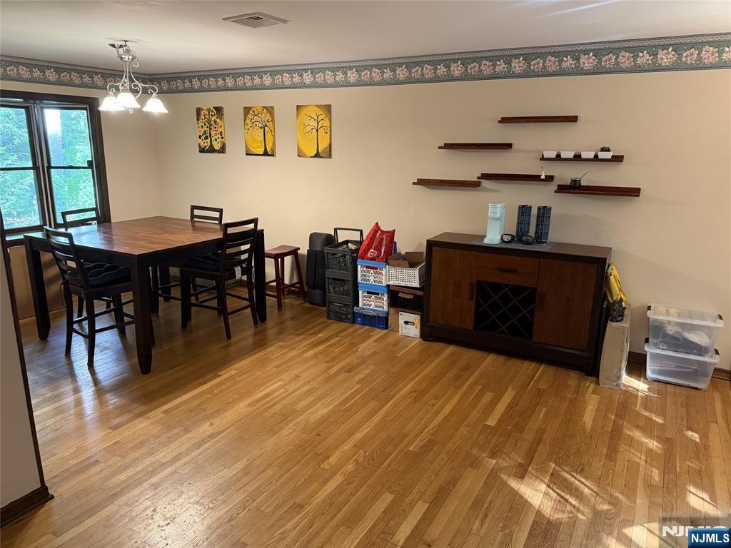36 Lavina Trail Oak Ridge, NJ 07438 - Photo 9 of 26 a living room with furniture and a dining table