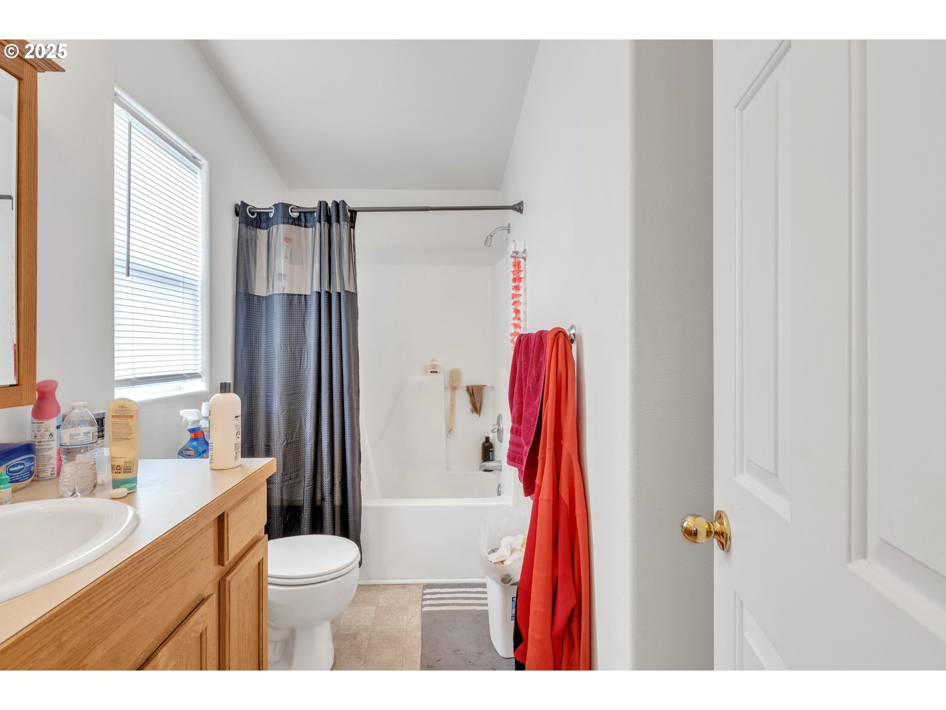 3397 Oak Street Florence, OR 97439 - Photo 16 of 48 a bathroom with a sink toilet and shower