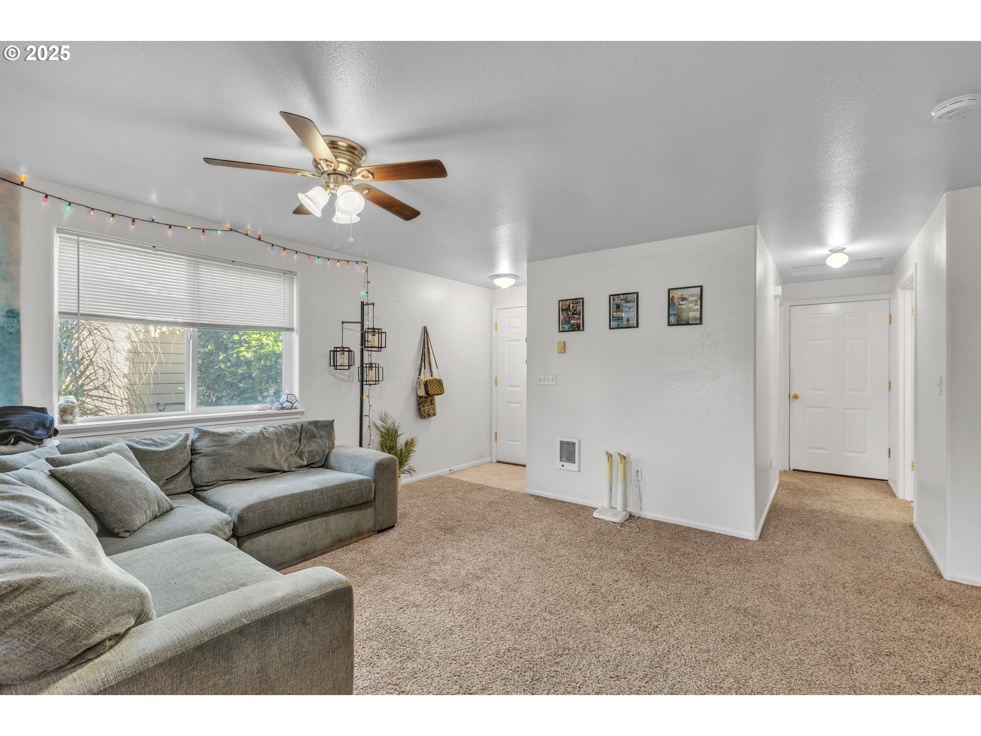 3397 Oak Street Florence, OR 97439 - Photo 27 of 48 a living room with furniture and a large window