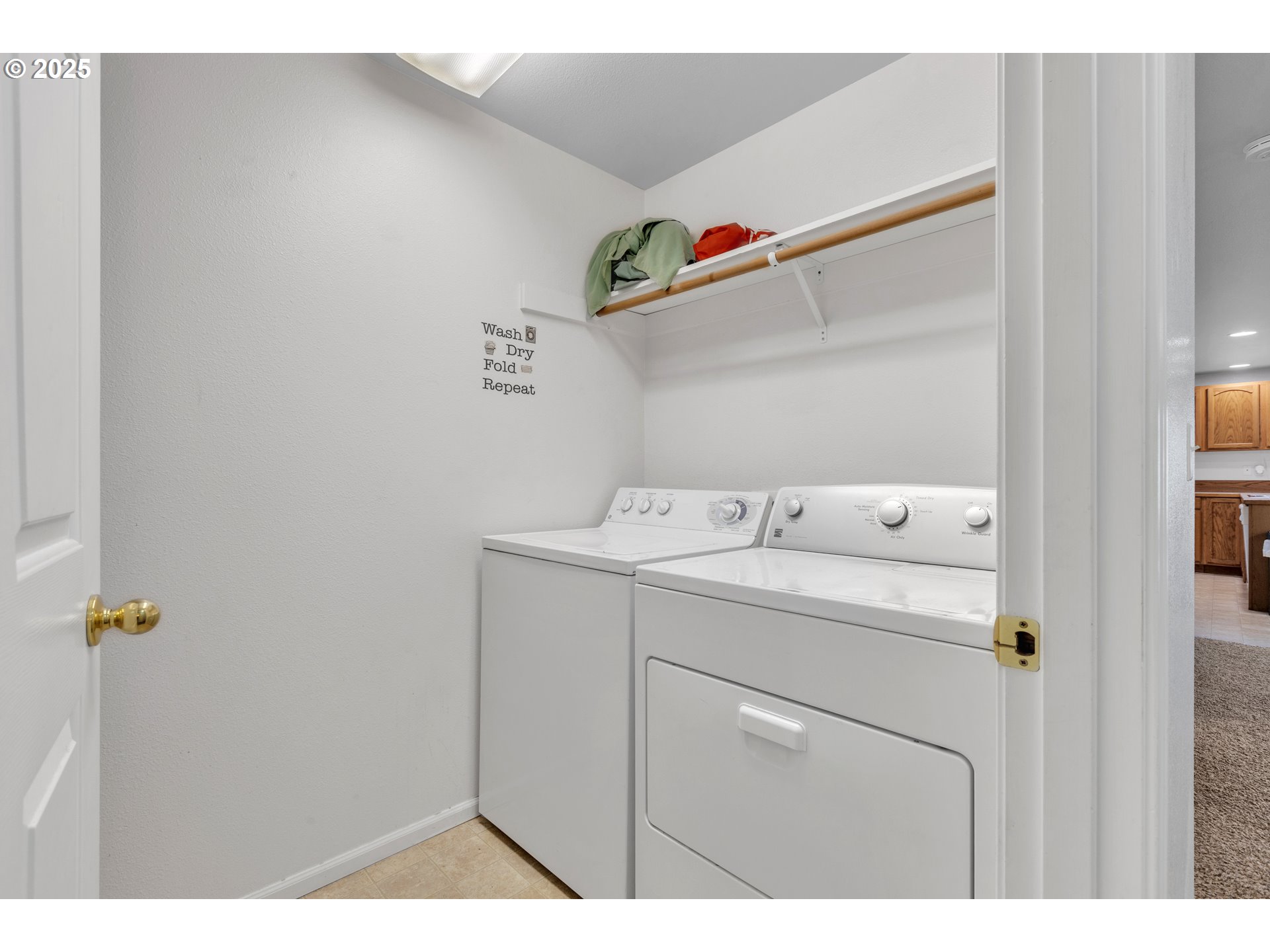 3397 Oak Street Florence, OR 97439 - Photo 44 of 48 a utility room with dryer and washer