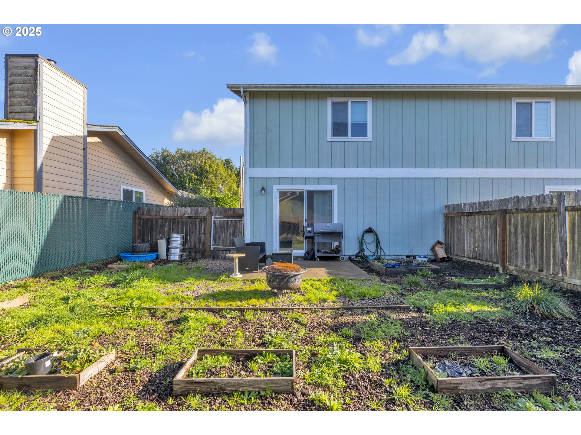 3397 Oak Street Florence, OR 97439 - Photo 47 of 48 a view of a house with pool and sitting area