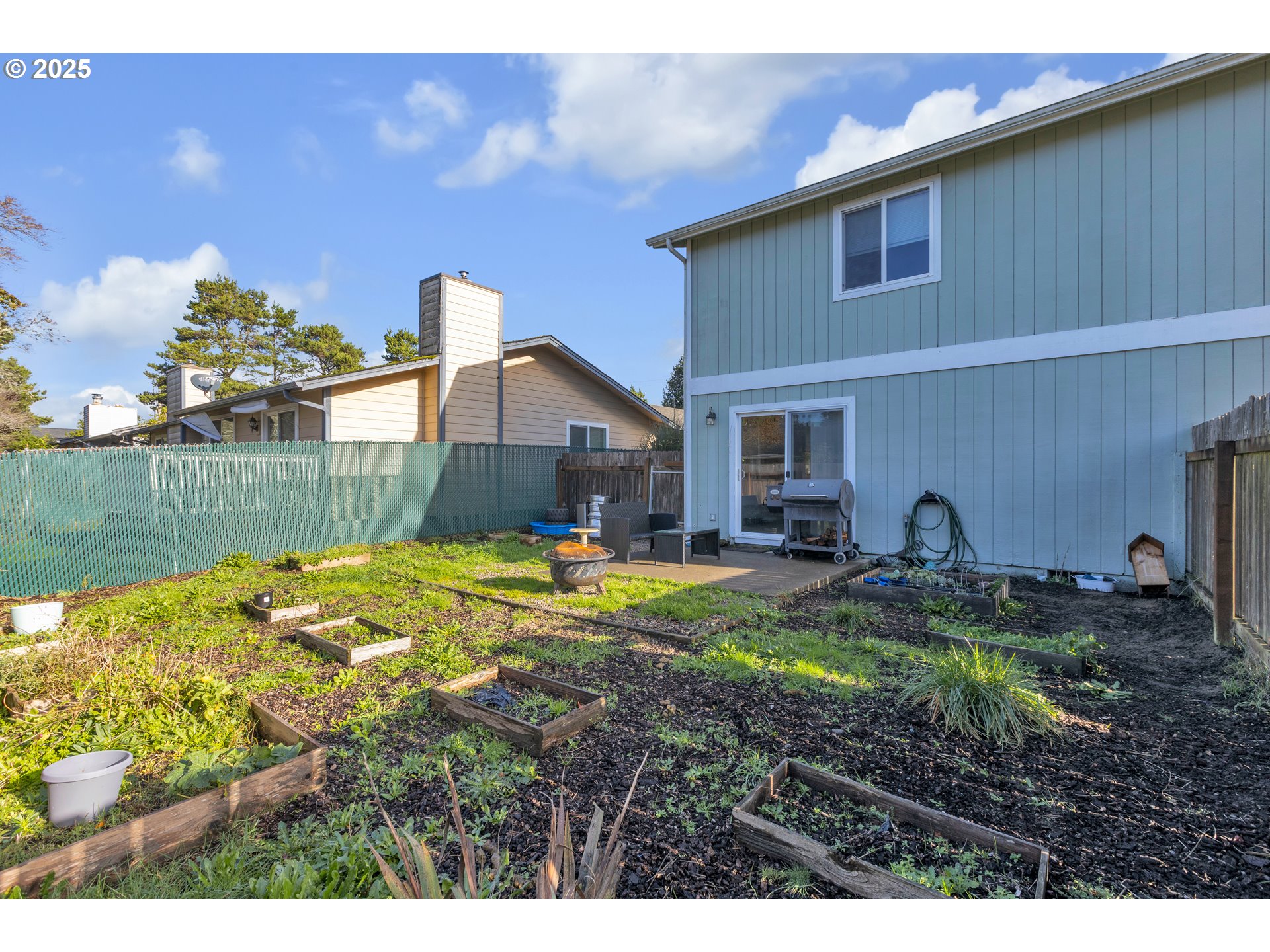 3397 Oak Street Florence, OR 97439 - Photo 48 of 48 a view of a house with backyard