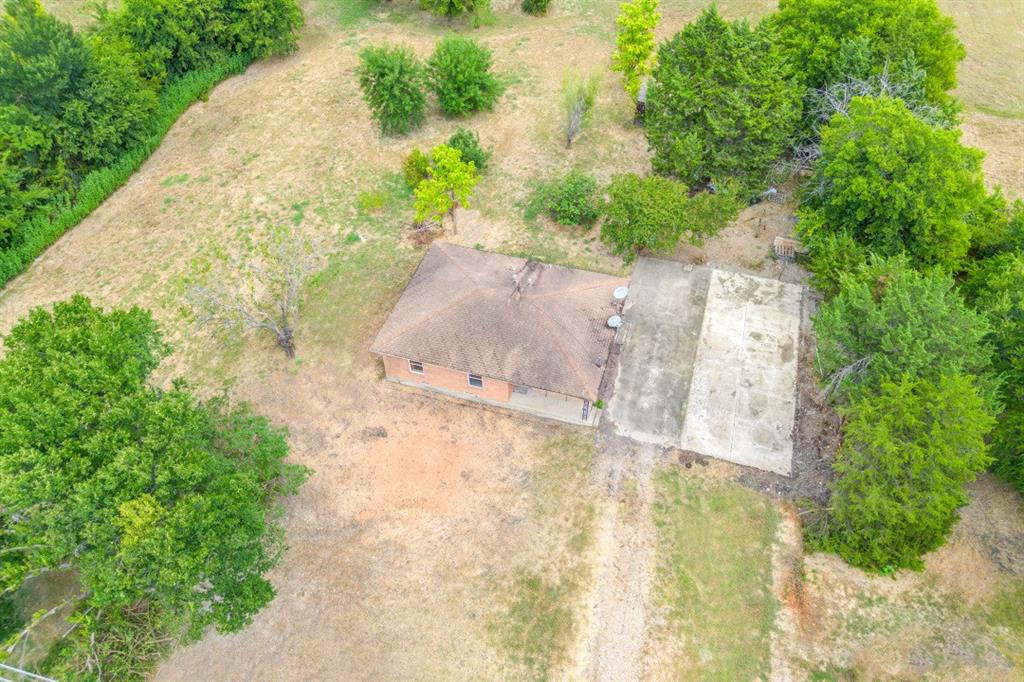 5627 Horizon Road Rockwall, TX 75032 - Photo 1 of 23 a view of a yard with plants and trees