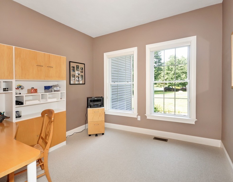 120 Colonial Ridge Drive Boxborough, MA 01719 - Photo 15 of 28 a view of a livingroom with furniture and a window