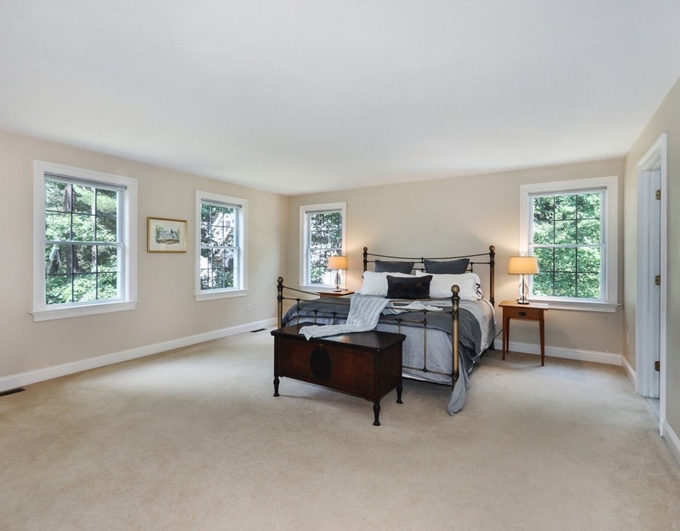 120 Colonial Ridge Drive Boxborough, MA 01719 - Photo 18 of 28 a bed room with furniture and a window
