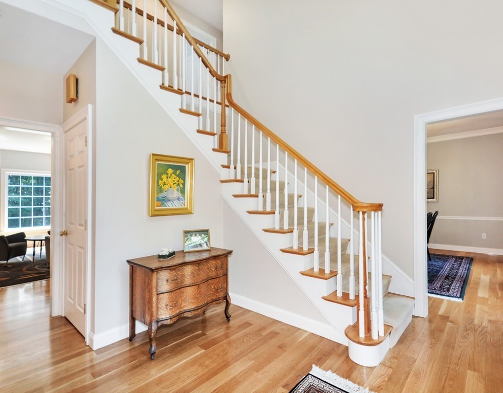 120 Colonial Ridge Drive Boxborough, MA 01719 - Photo 5 of 28 a view of entryway and hall with wooden floor