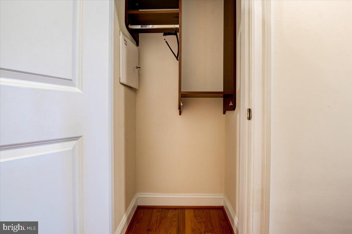 1023 North Royal Street, Unit 208 Alexandria, VA 22314 - Photo 20 of 29 a view of walk in closet with clothes