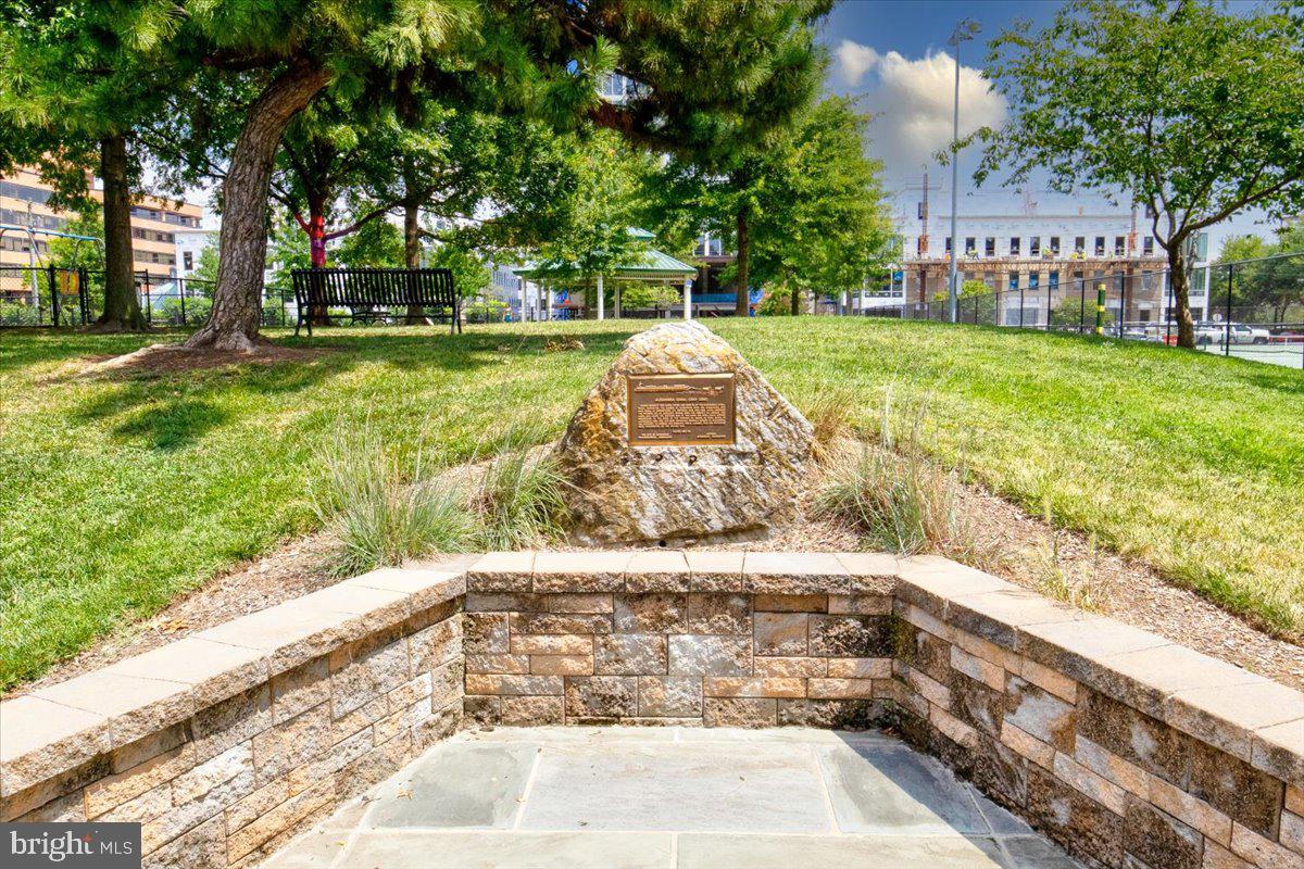 1023 North Royal Street, Unit 208 Alexandria, VA 22314 - Photo 23 of 29 a view of a backyard with a garden