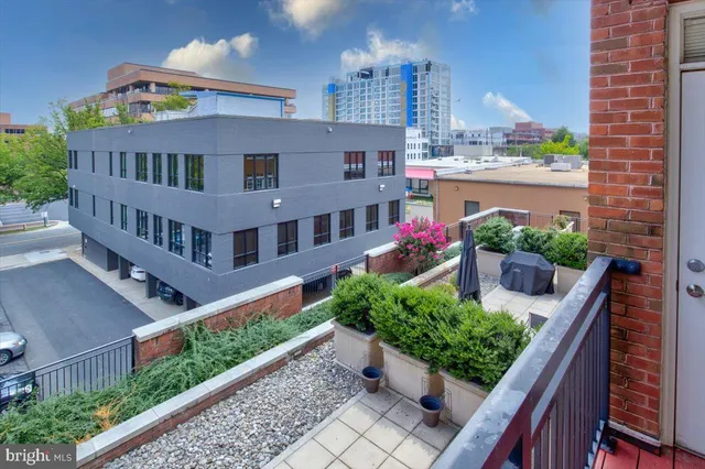 a view of a building from a balcony