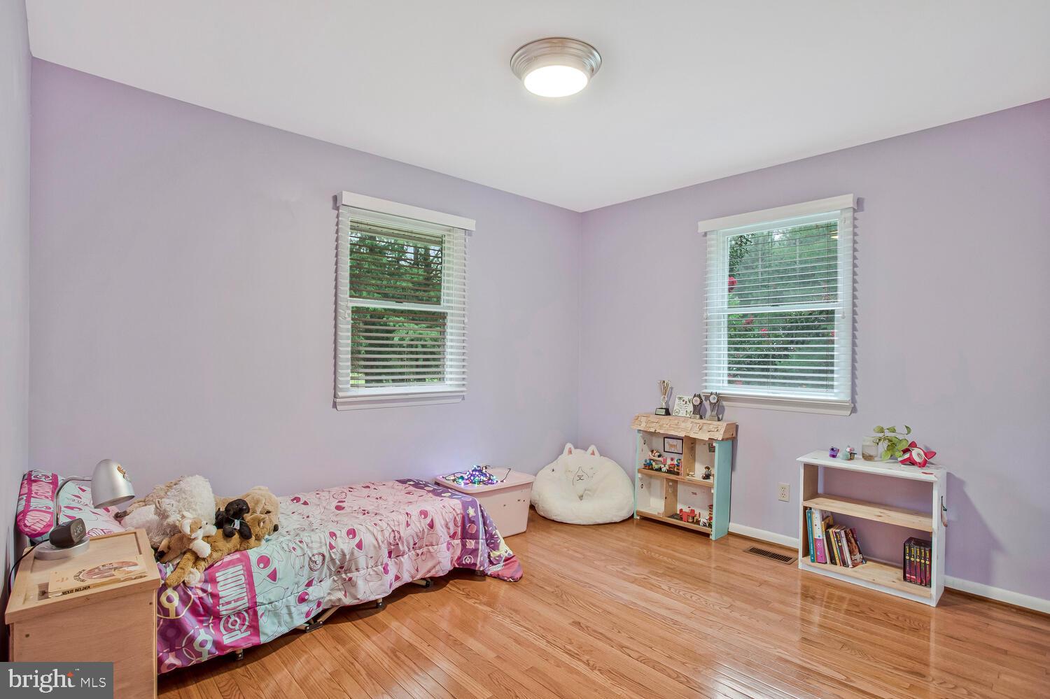 1110 Cox Road Huntingtown, MD 20639 - Photo 10 of 20 a bedroom with furniture and a window