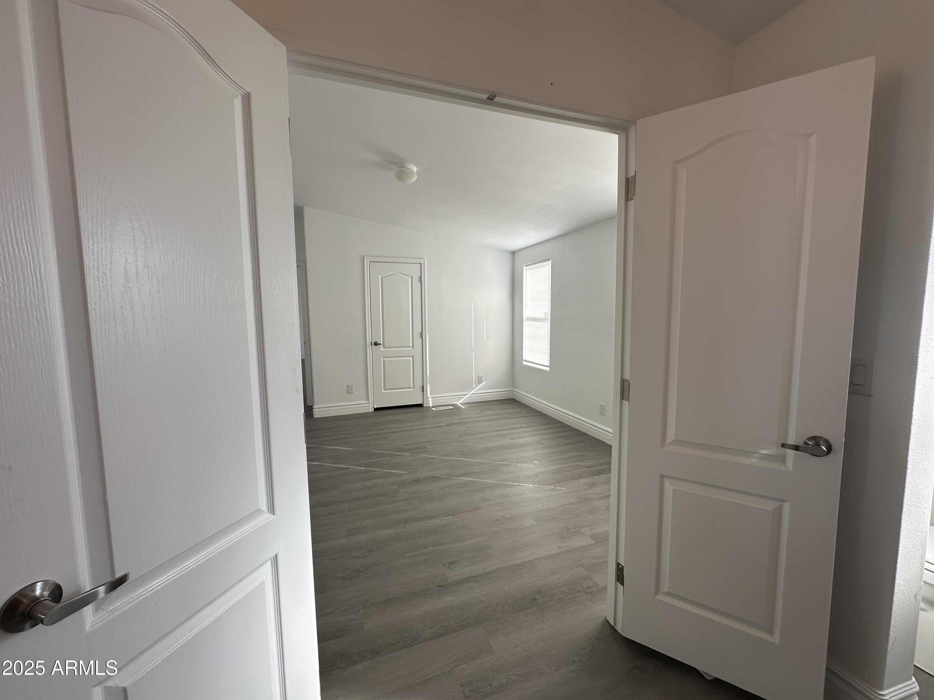38007 West McDowell Road Tonopah, AZ 85354 - Photo 38 of 44 a view of hallway with wooden floor