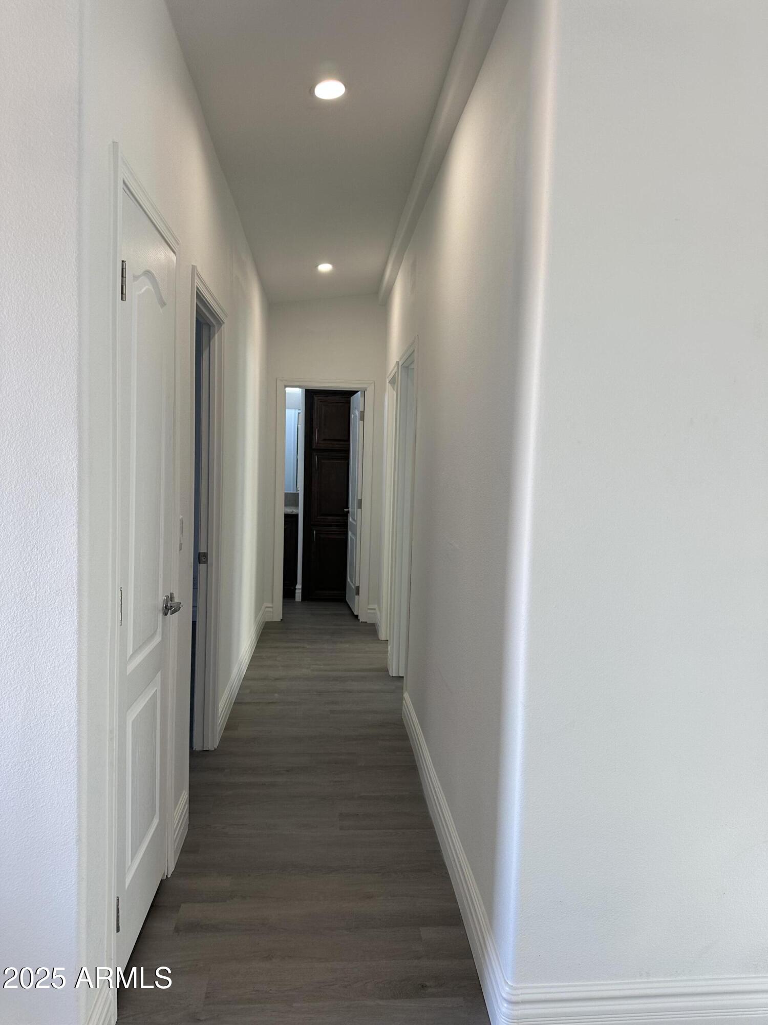 38007 West McDowell Road Tonopah, AZ 85354 - Photo 39 of 44 a view of a hallway with wooden floor