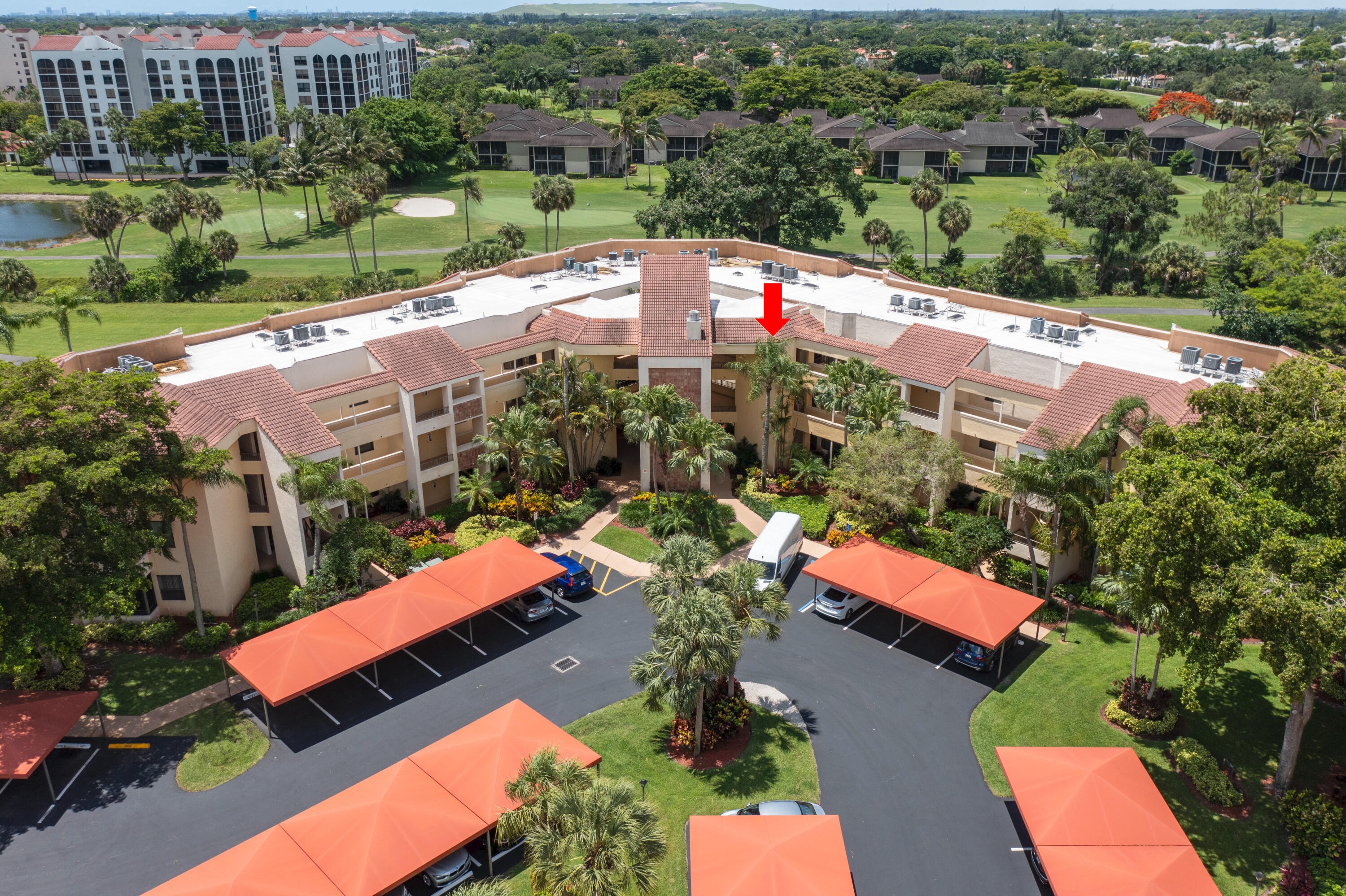 7520 La Paz Boulevard, Unit 104 Boca Raton, FL 33433 - Photo 2 of 56 an aerial view of a house