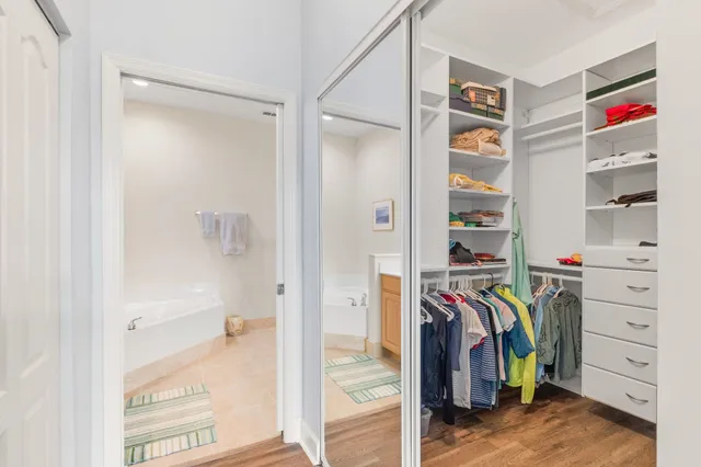 a bathroom with a shower and a sink