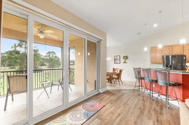 a view of a living room and dining room