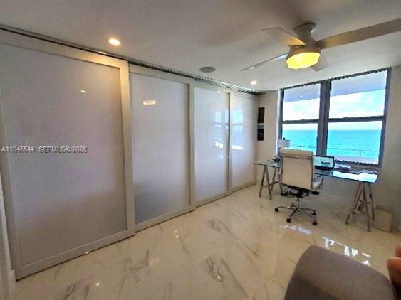 9225 Collins Avenue, Unit 1102 Surfside, FL 33154 - Photo 3 of 15 a very nice looking room with a window