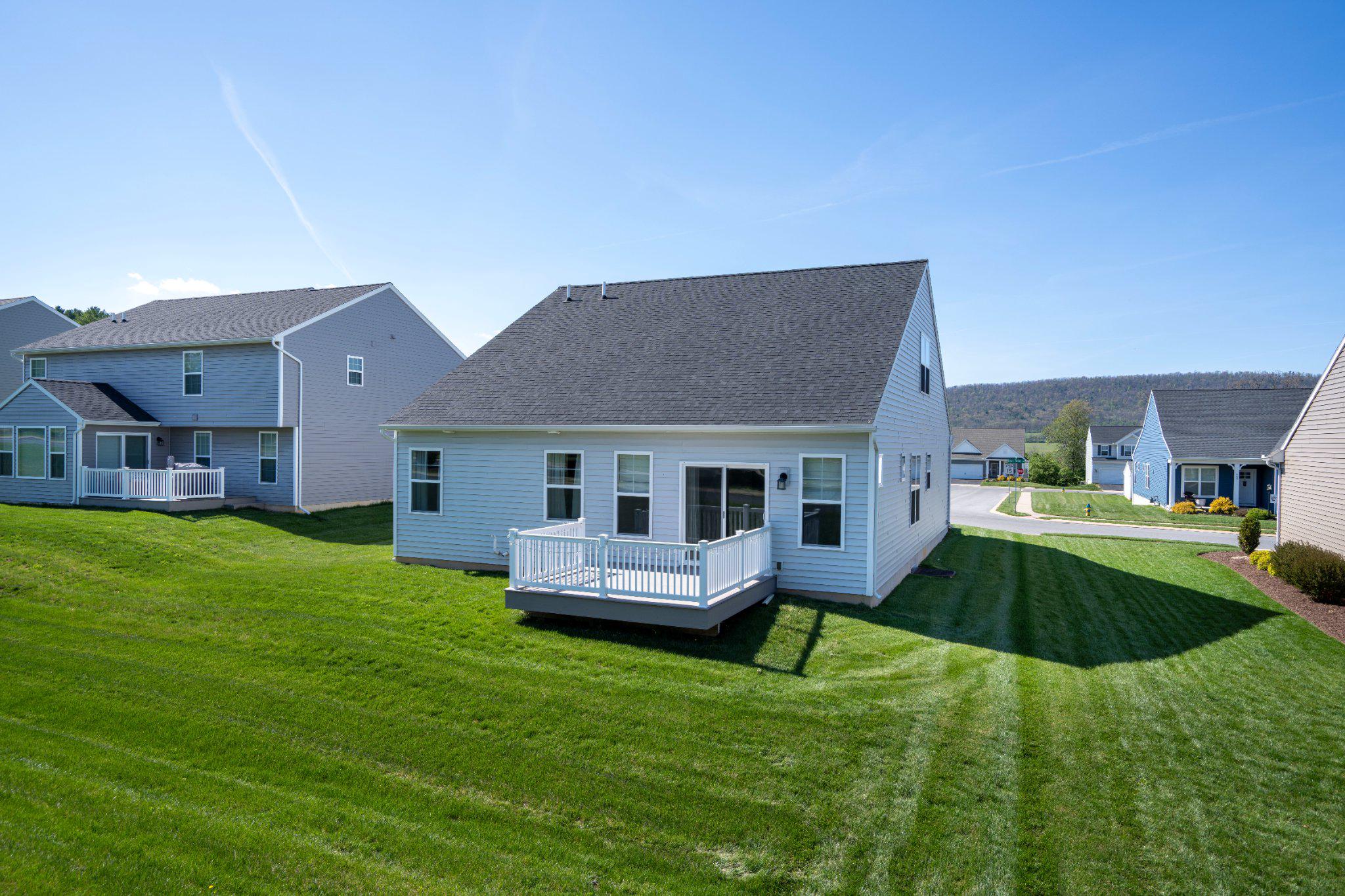 453 Fawn Valley Road State College, PA 16803 - Photo 45 of 51 a aerial view of a house with a yard table and chairs