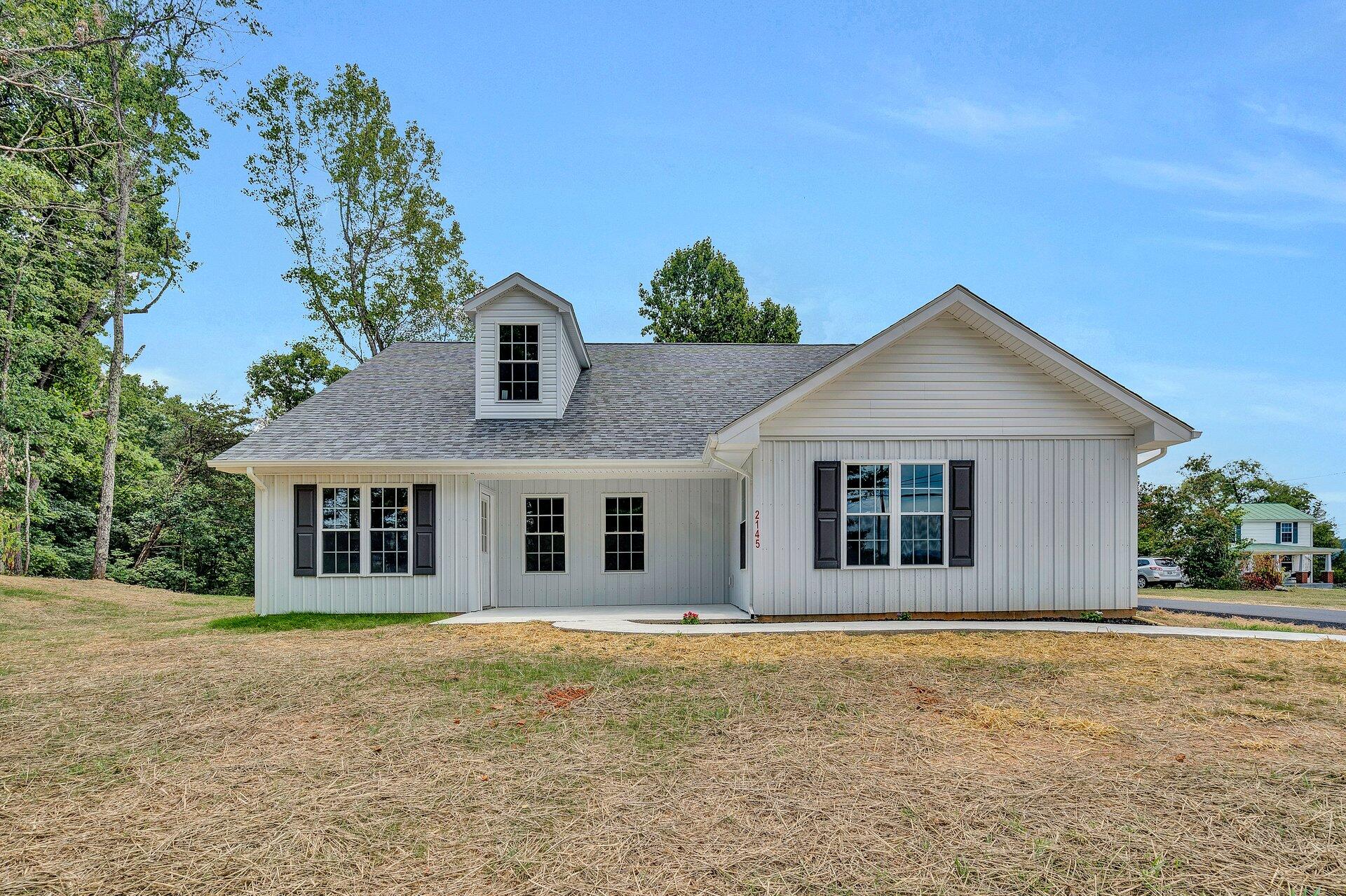 2145 Goodview Road Goodview, VA 24095 - Photo 1 of 31 front view of a house with a yard