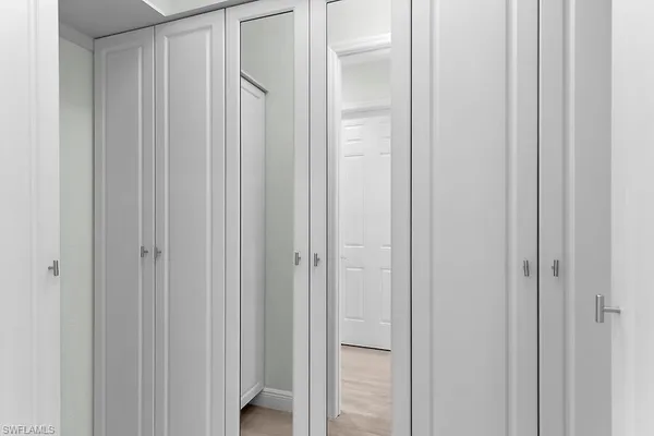 a view of a bathroom from the hallway