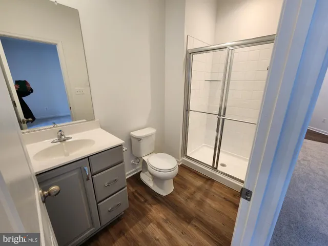 an empty room with windows and entrance