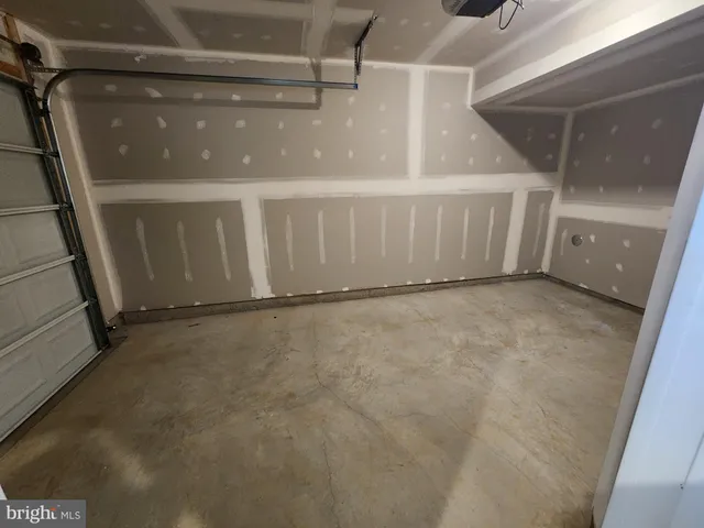 a front view of a house with a swimming pool