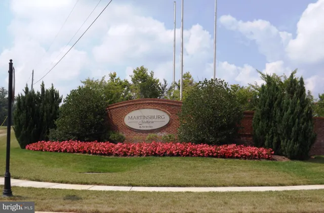 a view of a swimming pool with lounge chair