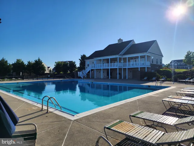 a view of a golf course with a lake