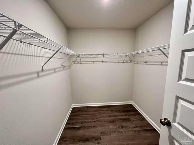 a view of a room with racks on the wall