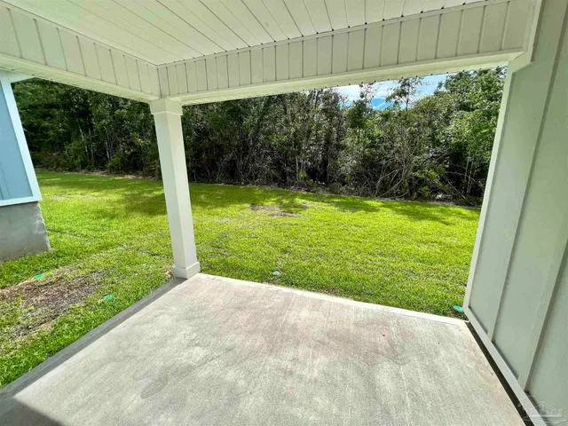 a view of a backyard with a garden