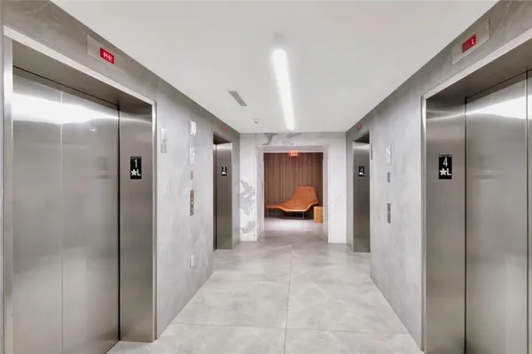 a view of a hallway and closet