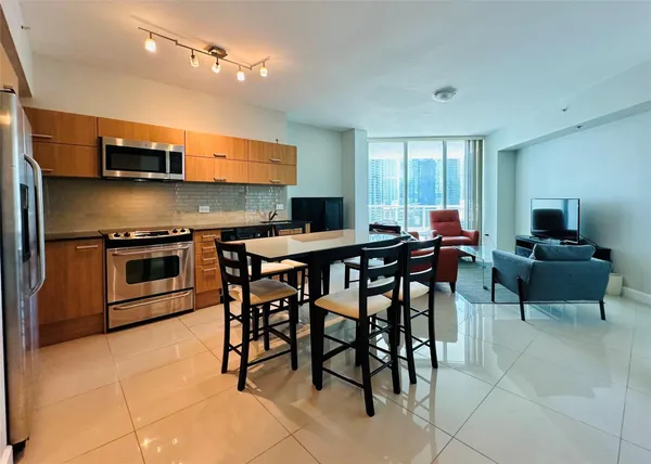 a view of a dining room with furniture