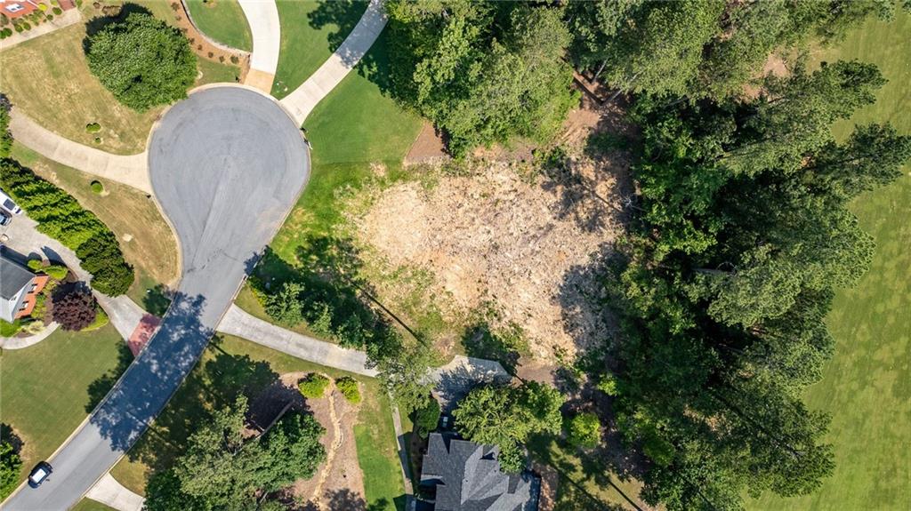 6 Irwin Court Northwest Rome, GA 30165 - Photo 21 of 31 an aerial view of a house with a yard and plants