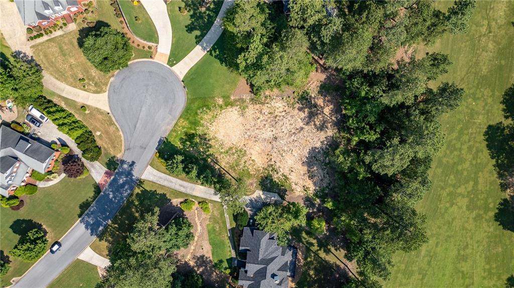 6 Irwin Court Northwest Rome, GA 30165 - Photo 23 of 31 an aerial view of a house with a yard and large trees