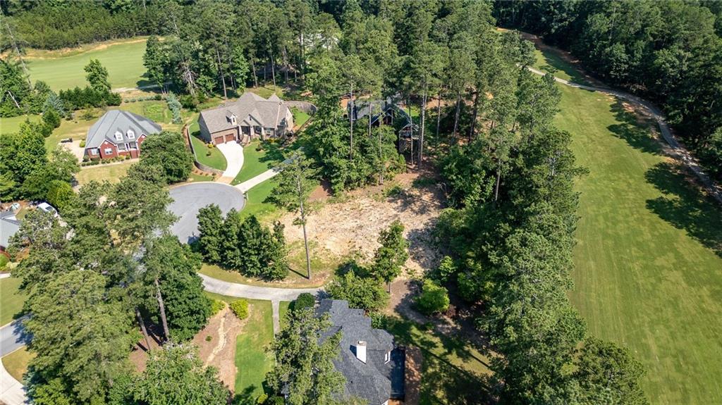 6 Irwin Court Northwest Rome, GA 30165 - Photo 26 of 31 an aerial view of residential house with outdoor space and trees all around