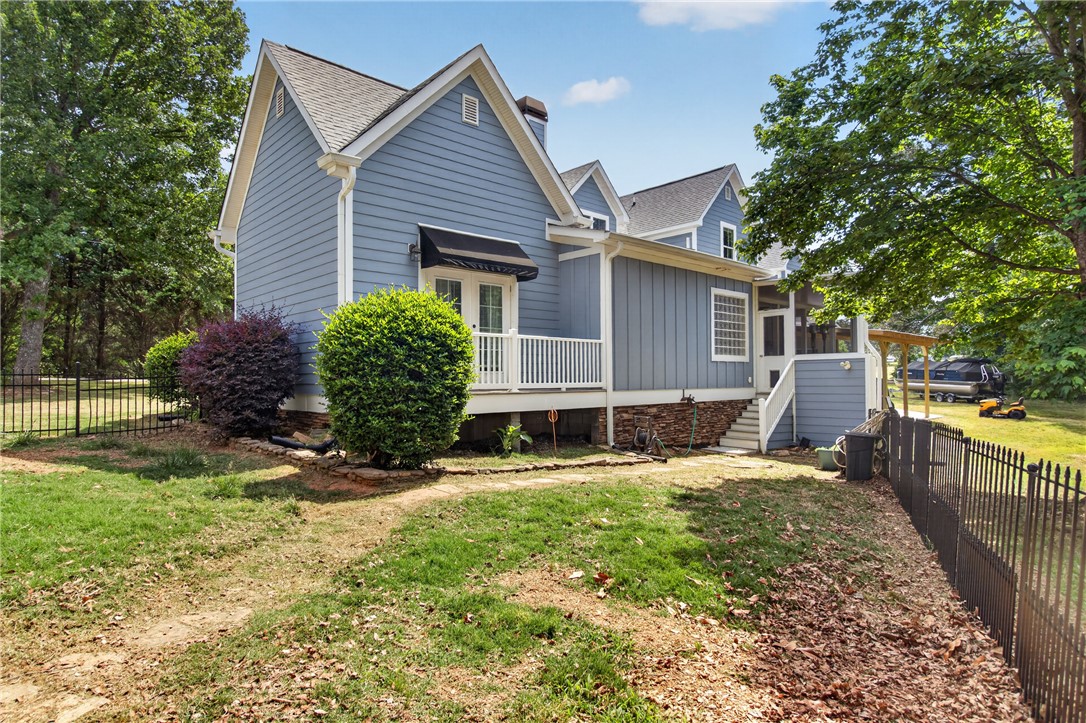 1504 Double Springs Road Townville, SC 29689 - Photo 22 of 41 This charming home offers a serene outdoor retreat with thoughtful exterior details.
